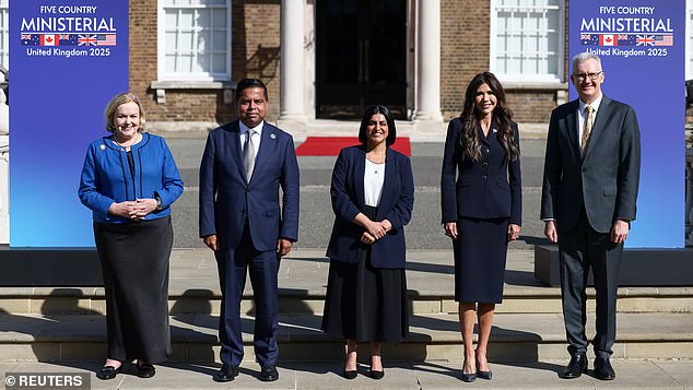 Home Secretary Shabana Mahmood, centre, poses with U.S. Homeland Security Secretary Kristi Noem, Canada's Public Safety Minister Gary Anandasangaree, Australia's Home Affairs Minister Tony Burke and New Zealand's Attorney General Judith Collins at the opening of a "Five Eyes" security alliance summit in central London