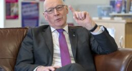Now Swinney accused of 'burying his head in   sand'