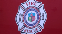 Officials investigating garage fire in Danville that left firefighter with minor injuries