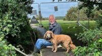 Pensioner chains himself to footbridge to stop it being demolished