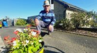 Pensioner fights council after being told to remove three plant pots