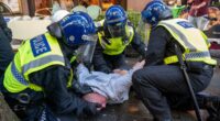 Police chiefs blast anti-migrant protesters after 26 officers injured