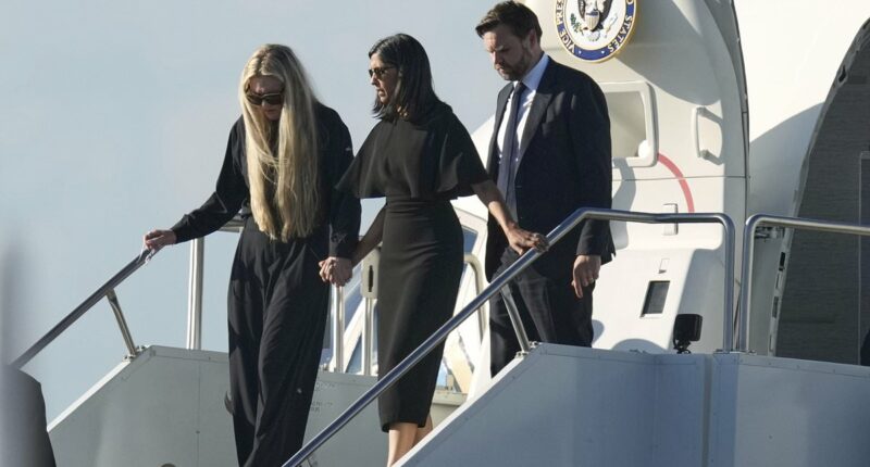 Powerful moment Charlie Kirk's widow Erika holds hands with Usha Vance