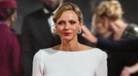 Princess Charlene of Monaco, 47, stuns in a showstopping white backless gown during solo appearance at the Ballon D'Or - and makes rare reference to her time as an Olympic athlete