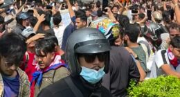 Protesters set fire to Nepal's parliament building