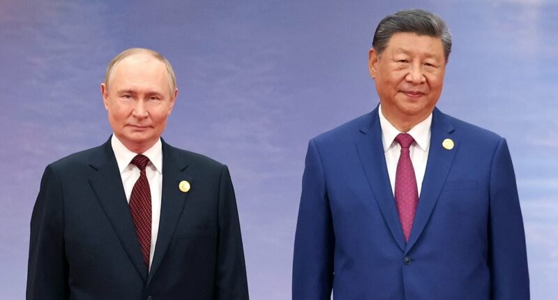 Putin and Xi in picture to chill West... so what was Modi doing there?