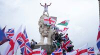 Thousands march in London in support of far-right activist Tommy Robinson