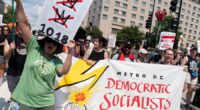 Thousands protest for a 'Free DC' on the fourth week of federal control in Washington