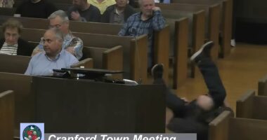 Town hall menace BREAKDANCES before stunned locals in rant about taxes
