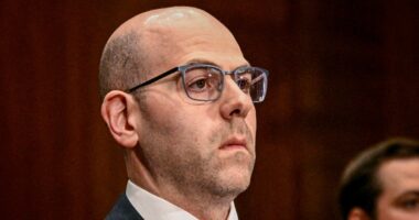 Trump nominee plans to keep White House job if he's confirmed for Fed post