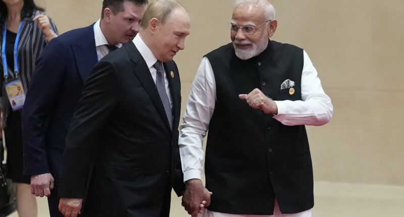 Trump rages as Putin and Indian prime minister Modi cozy up