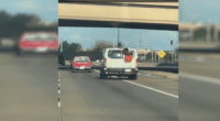Video: Inmate hangs out of van on Oklahoma highway