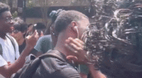 Video captures man acting out Charlie Kirk's assassination at Texas State vigil; Abbott calls for expulsion