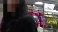 Woman's hand signal for help leads to arrest