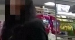 Woman's hand signal for help leads to arrest