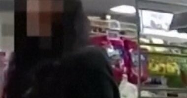 Woman's hand signal for help leads to arrest