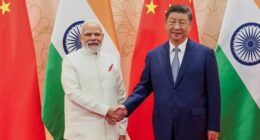 Xi and Modi talk friendship in a 'chaotic' world as Trump's tariffs bite