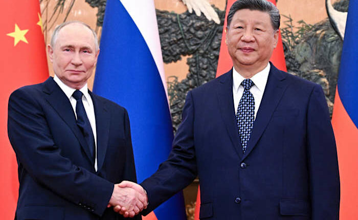 Xi and Putin reaffirm 'old friend' ties in the face of US challenges