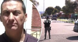 Cops swarm quiet street in manhunt for accused cop killer