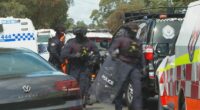 Man arrested after hour-long siege, stabbing in western Sydney