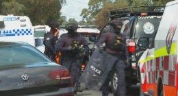 Man arrested after hour-long siege, stabbing in western Sydney