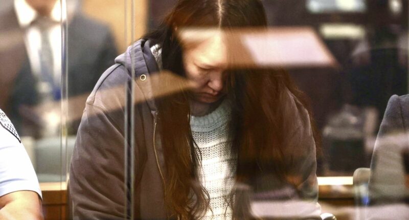 Woman accused of murdering children, leaving their bodies in luggage on trial