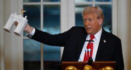 President Donald Trump addresses a dinner for donors who have contributed to build the new ballroom at the White House, Wednesday, Oct. 15, 2025, in Washington. (AP Photo/John McDonnell)