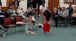 Activists strip to protest trans athletes at school board meeting
