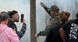 Armed federal agents clash with crowd in Chicago