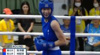 Astonishing moment gender-row boxer smirks as opponent throws in towel