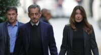 Au revoir, Carla: Sarkozy kisses distraught wife as he heads to prison