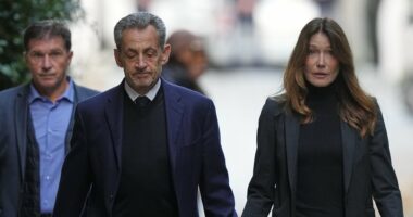 Au revoir, Carla: Sarkozy kisses distraught wife as he heads to prison