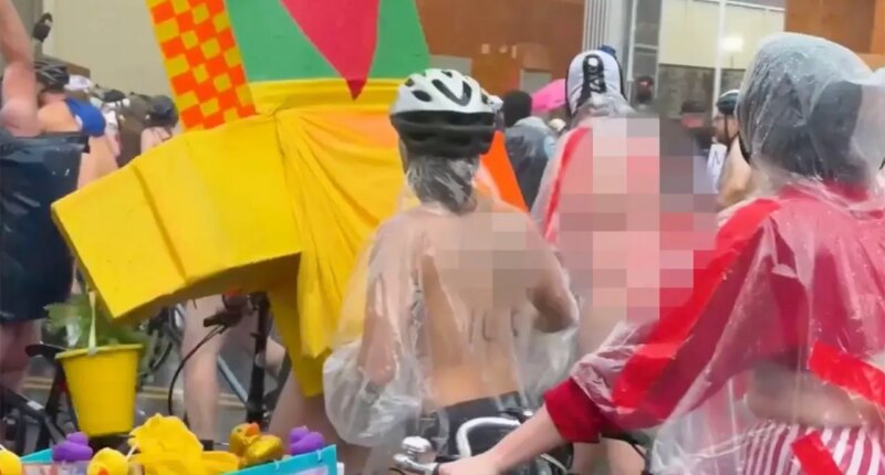 Bare-bottomed bikers roll through rain to shout at feds in blue city's latest anti-ICE stunt