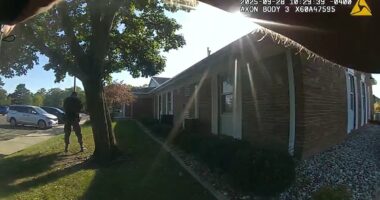 Bodycam footage shows moment cops shoot down Michigan church killer