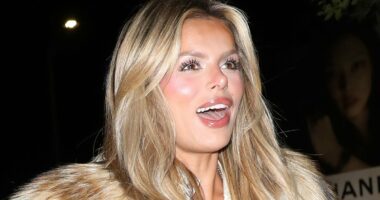 Brooks Nader suffers a nip slip as she spills out of her blouse