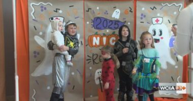 Carle trick-or-treat event reunites nurses with former patients