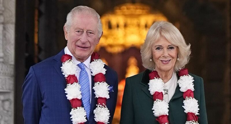 Charles and Camilla don flower garlands as they celebrate 30th anniversary of Neasden Temple