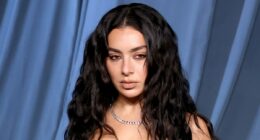 Charli XCX stuns in dramatic lace and leather gown