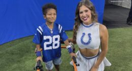 Colts cheerleader uses sign language to converse with deaf fan at his first game