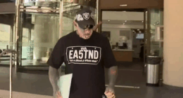 Cops label bikie 'middle-aged man playing dress-ups' over Nazi tat charge