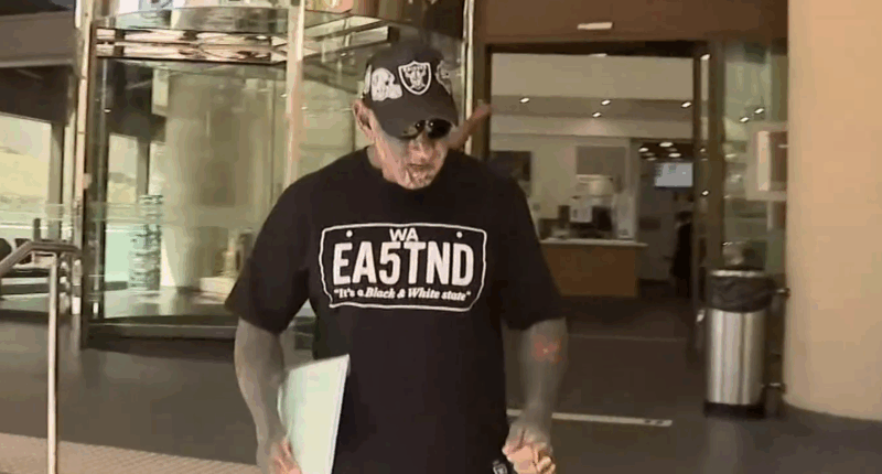 Cops label bikie 'middle-aged man playing dress-ups' over Nazi tat charge