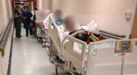 Corridor care crisis as traumatised patients witness deaths and liken NHS hospitals to a war zone