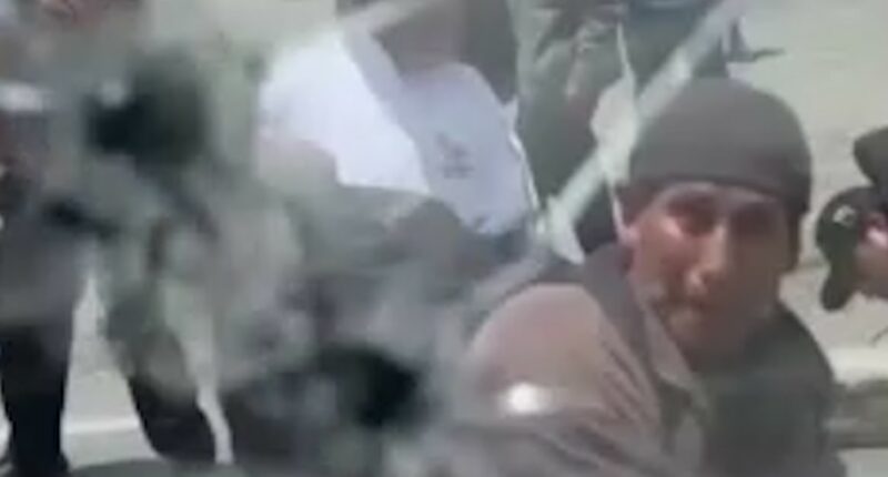 Crowd attacks Ecuadorian president's car with rocks