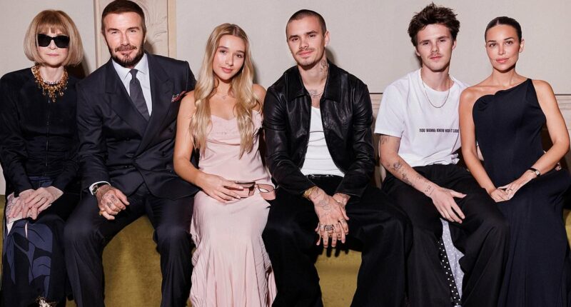 David Beckham gushes over Victoria as family sit united at Paris show