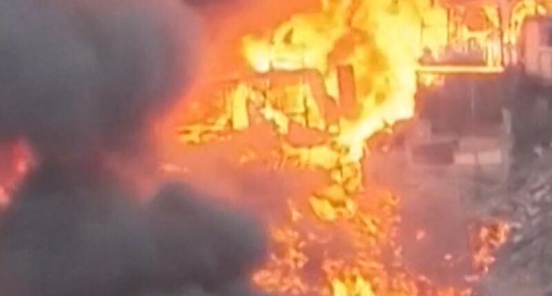 Drone footage shows massive fire engulfing Peru homes