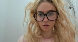 Elon Musk's ex Grimes baffles fans with bizarre circular face tattoo as they insist inking looks like RINGWORM