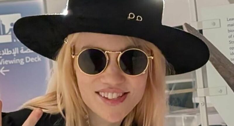 Elon Musk's ex Grimes sparks outrage after including Charlie Kirk on her new album cover art