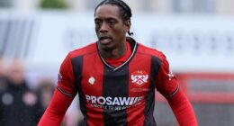 Ex-Premier League bad boy - who was convicted of armed robbery at 15 and has been in jail twice - joins eighth tier side in bid to continue football career