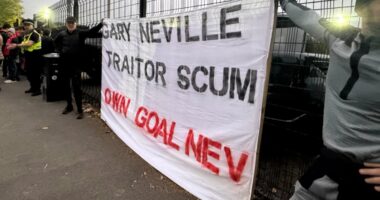 Fans turn on 'traitor' Gary Neville: £1.1m-a-year pundit is targeted by protest outside his flagship hotel and at football club he owns after his 'racist' Union Jack rant