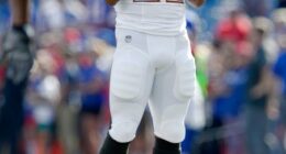Former NFL player who died in police custody battled injuries and mental health challenges